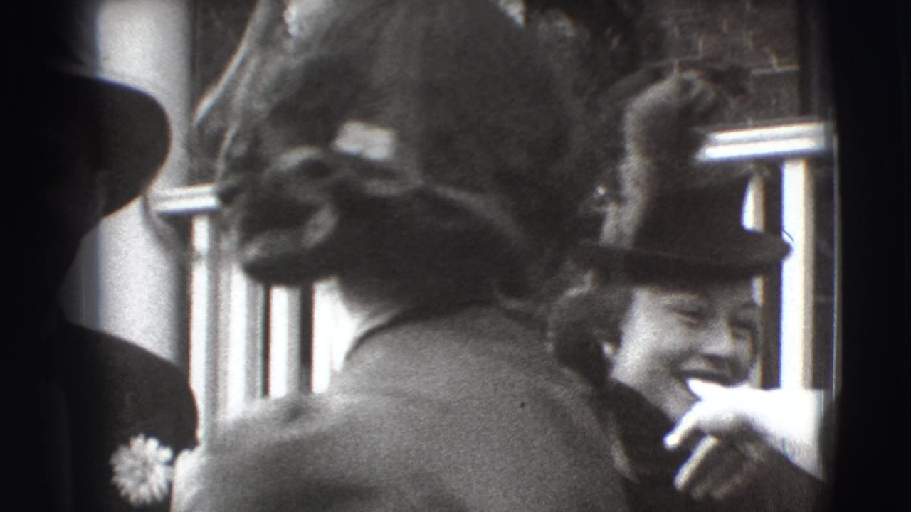 Guests in hats gather near a porch railing while a woman smiles.