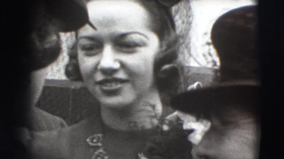The final frame shows the same formal 1941 Joliet gathering, with a smiling woman surrounded by adults in hats and suits.
