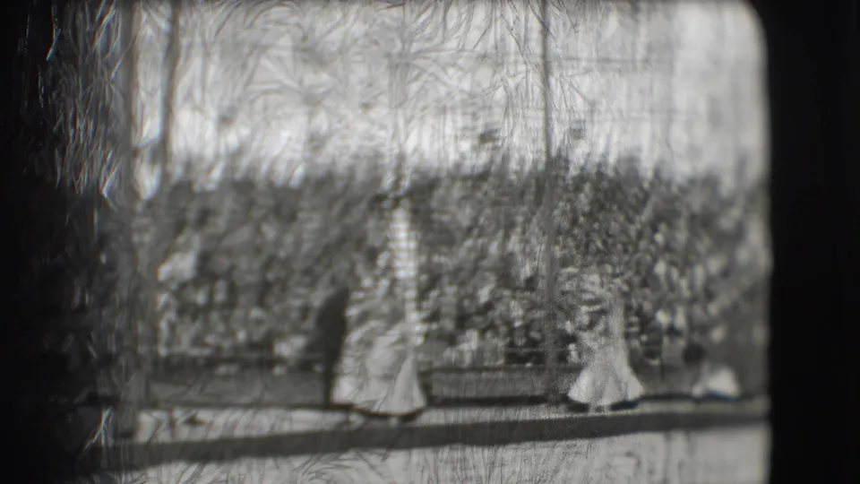 A wide 1948 Ringling Brothers Sarasota view shows performers crossing the circus ring with grandstand spectators behind them.