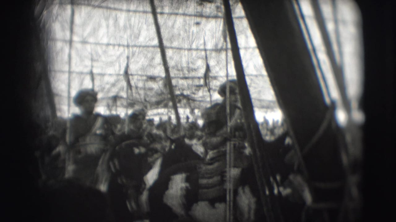 Mounted performers in armor ride past with lances and spears visible.