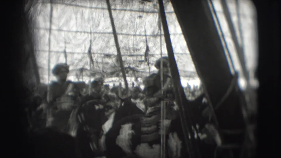 Armored riders on horseback move through the Sarasota Ringling Brothers tent performance with lances visible in the background.