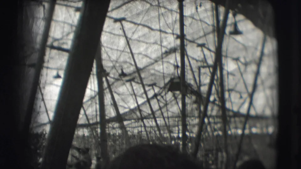 1948 Ringling Brothers circus view from inside the tent, with support poles framing the ring and distant spectators.