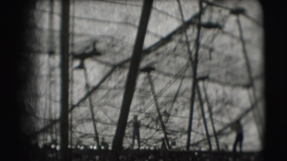 Final frame shows multiple trapeze lines, support poles, and distant silhouetted performers inside the 1948 Sarasota circus tent.