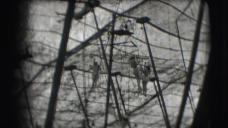 The closing sampled frame shows several silhouetted figures and angled rigging lines during the 1948 Sarasota circus trapeze performance.