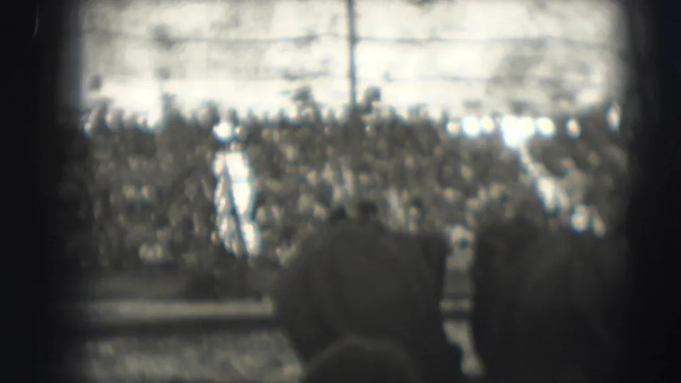 1948 Sarasota circus crowd and ring area filmed from the stands, with spectator heads in the foreground.