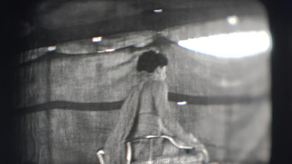 A woman rides a horse beneath a circus tent canopy in the 1948 Sarasota Ringling Brothers home-movie footage.