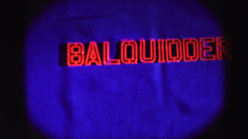 1952 8mm place-title card showing Balquidder in red outlined lettering over a blue projected field.