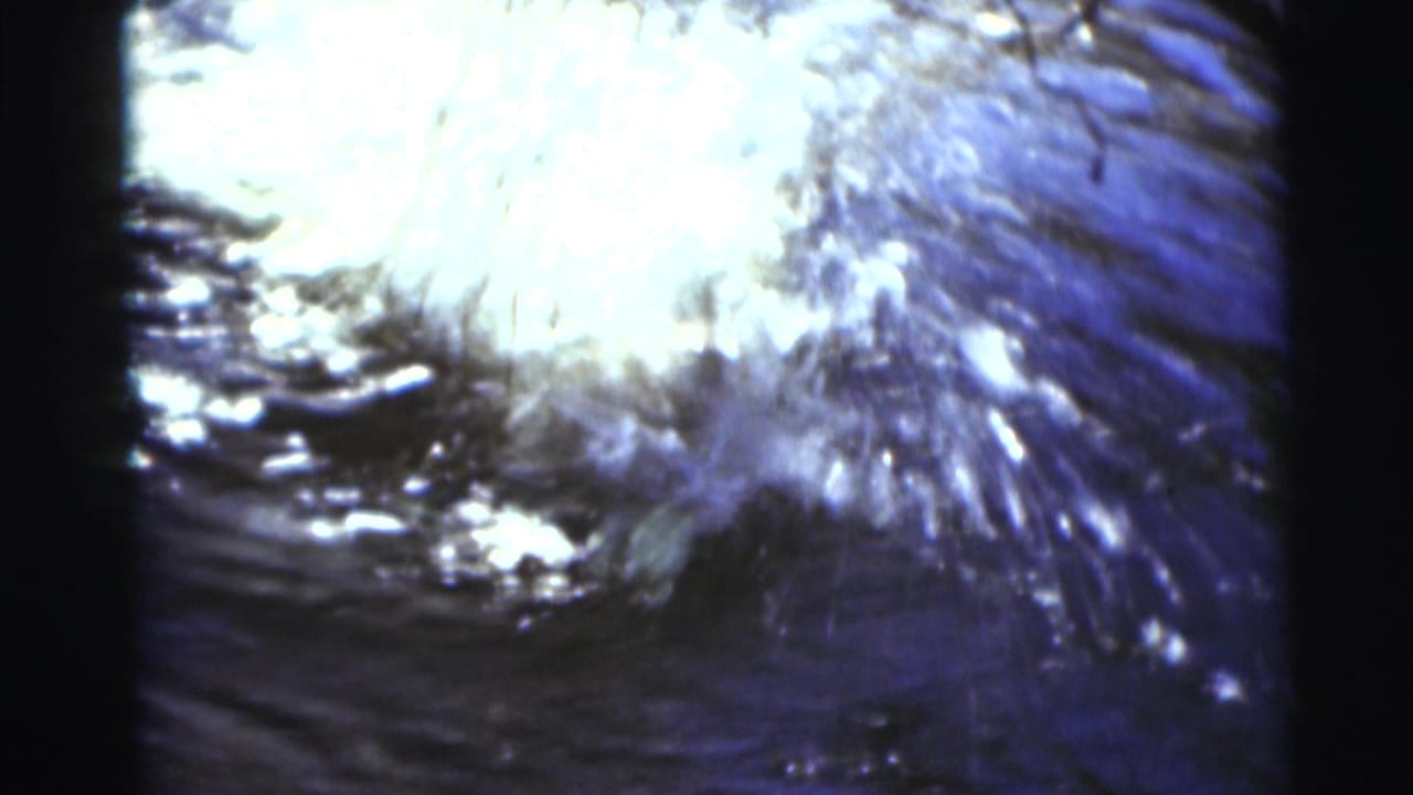 Bright splash and ripples on the lake surface.
