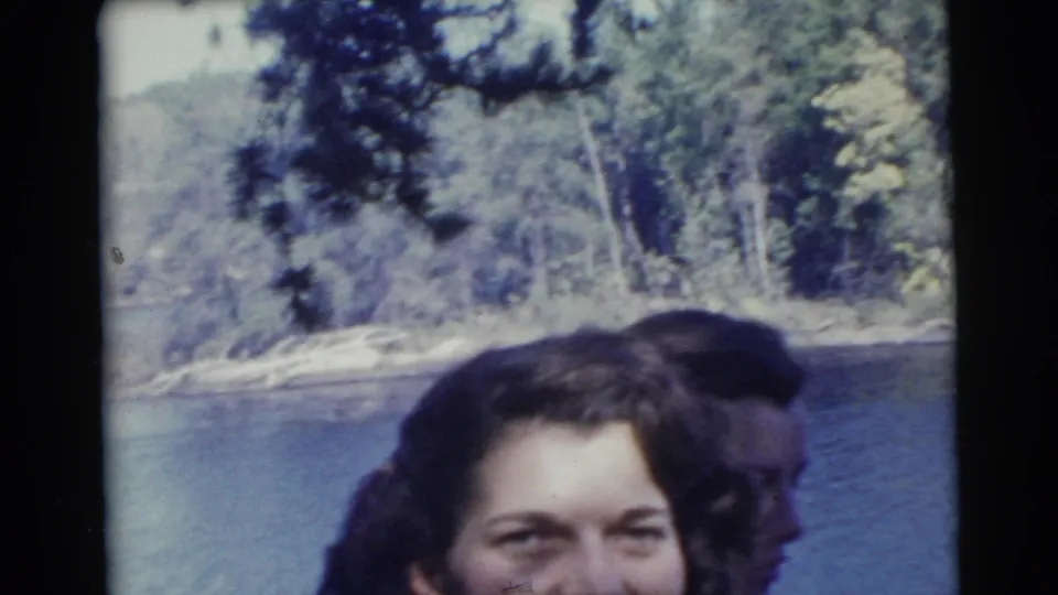 The final frame partially crops the women near the lake, with a wooded shoreline behind them in the 1956 Miami clip.
