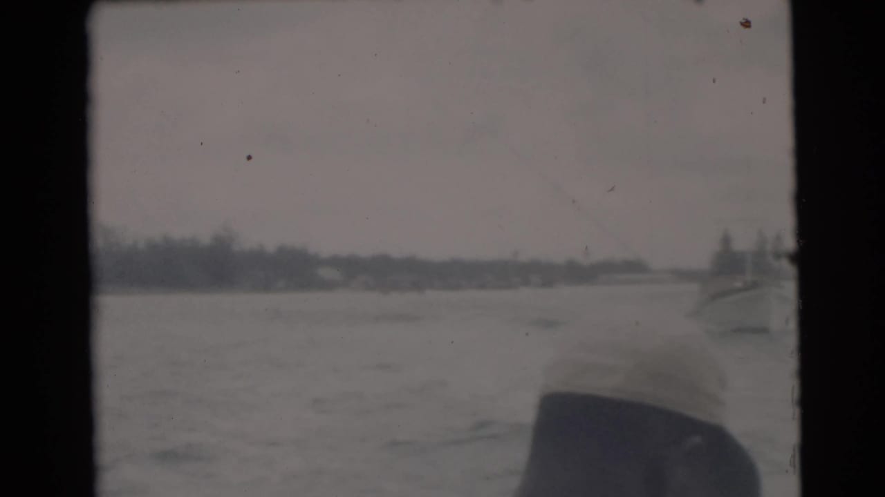 River view with a man partly visible at the right edge of the frame.