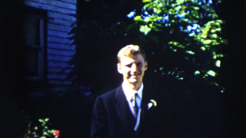 The final frame shows the young man in a dark suit and boutonniere outside in Moline, Illinois, with leafy greenery behind him.