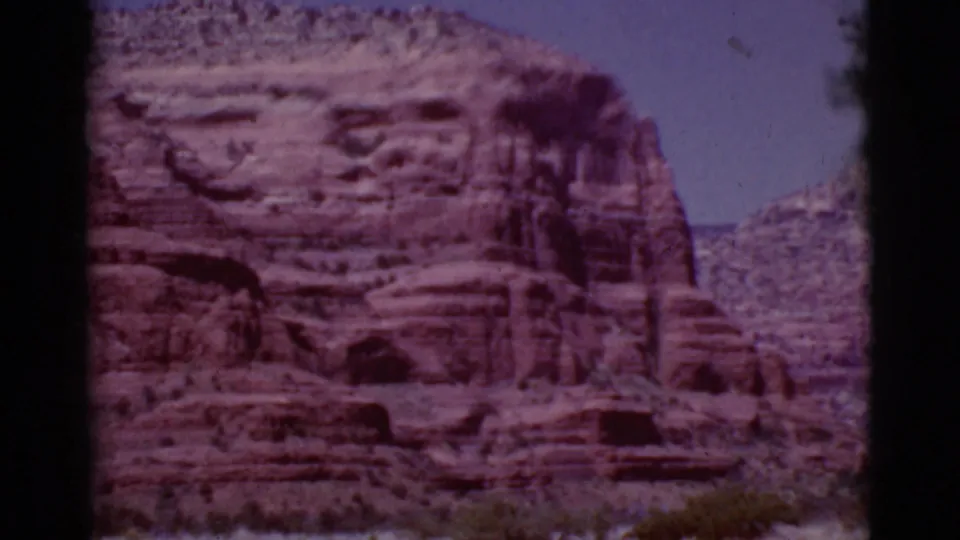 Soft 8mm view of a red rock formation in Arizona, seen after the yard footage in the same 1968 clip.