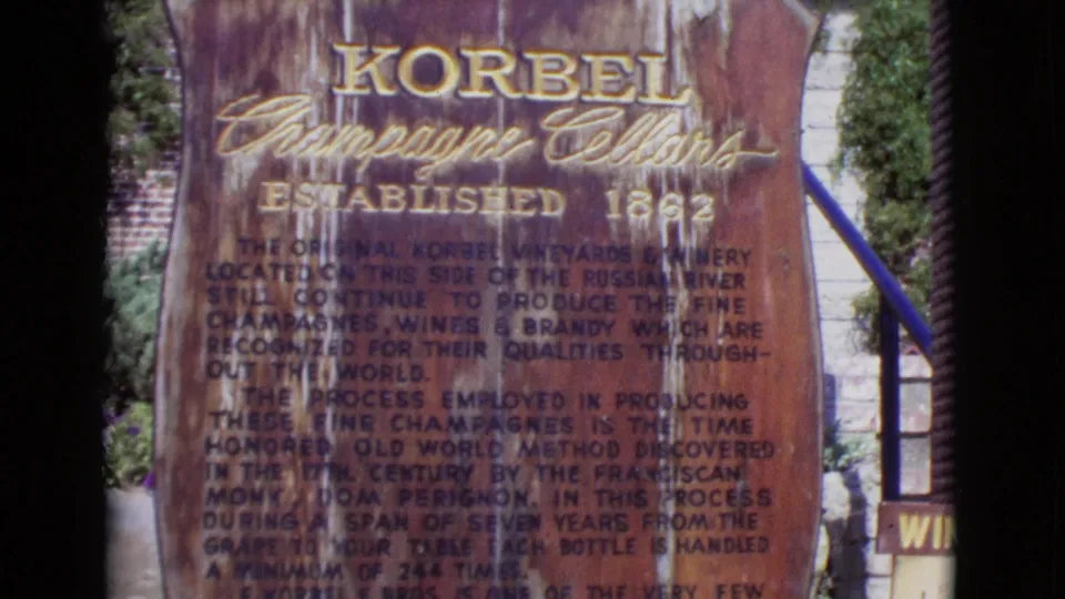 Final 1968 San Diego County frame of the Korbel Champagne Cellars sign, with the established date and descriptive text still visible.