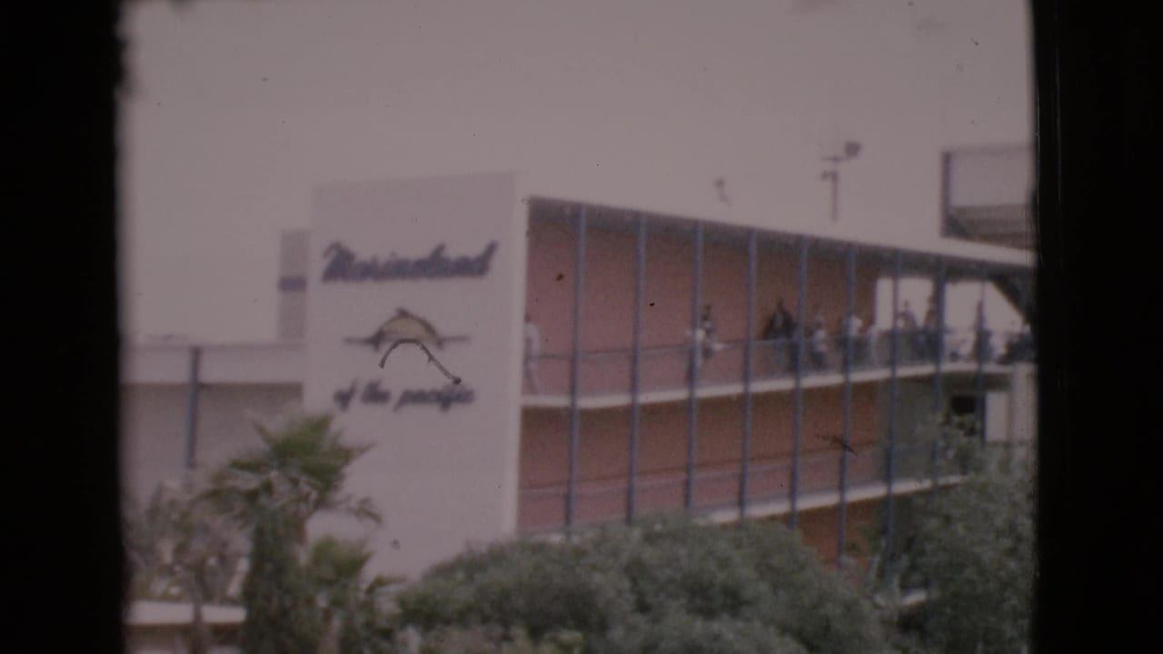 MarineLand of the Pacific signage and an upper observation balcony with visitors visible along the 1968 attraction building.
