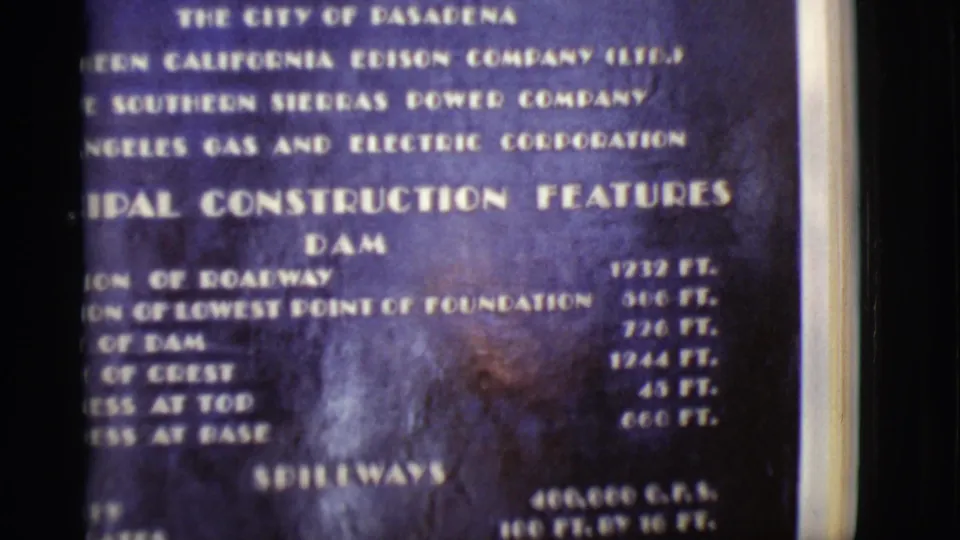 1968 Arizona frame of a Boulder Canyon Project display section with dam measurements and spillway capacity text.
