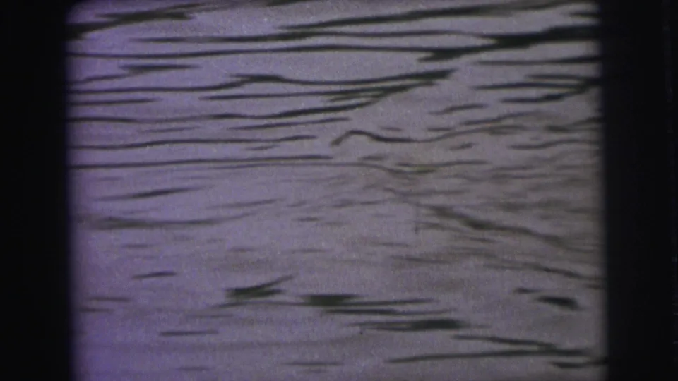Open rippling lake water, softly focused in the 1973 Superior, Wisconsin 8mm footage.