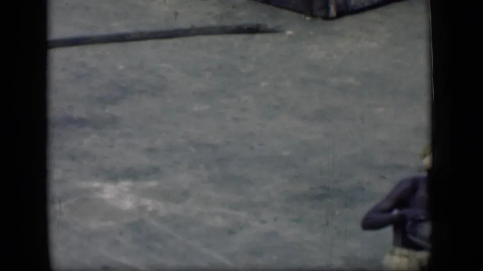 The final frame shows the street surface with only a partial worker at the right edge, suggesting the cart has moved out of view.