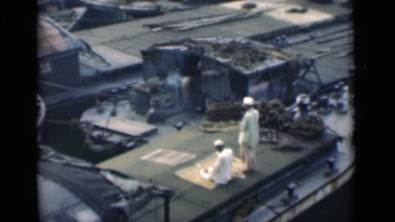 The Calcutta boat-deck scene shows a kneeling man on a mat and a standing man beside cargo ropes and a small deck structure.