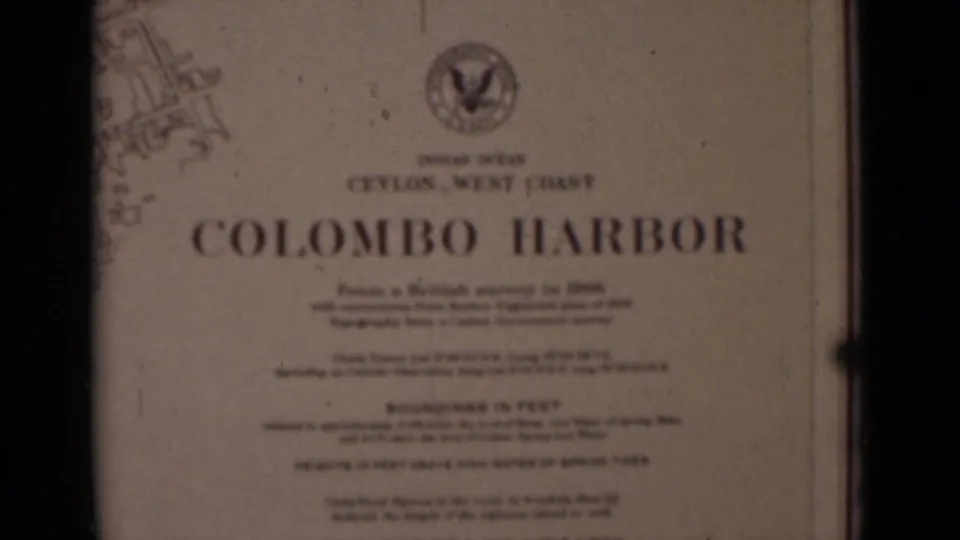 The Colombo Harbor title card remains centered, showing Ceylon West Coast text, a printed emblem, and softened smaller survey text.