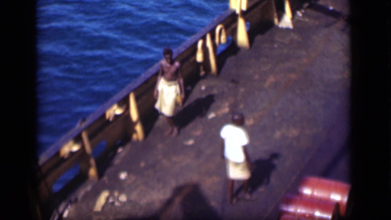 At the end of the 1946 Suez Canal clip, two men remain visible on the deck near railings and bright blue water.