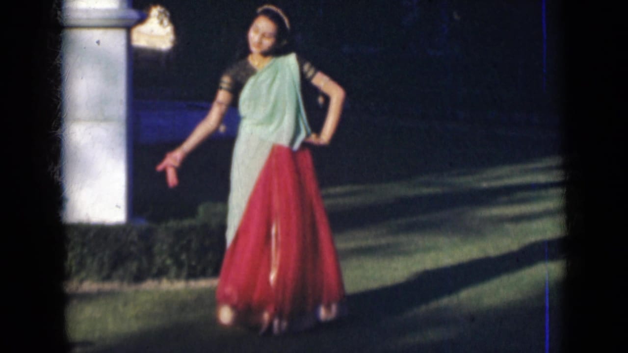 In the final frame, the woman holds a graceful dance pose on the lawn, with a white pillar and dark foliage behind her.