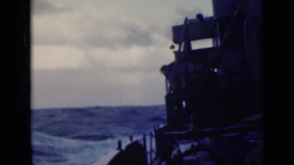 A deck-side 8mm view shows part of the vessel's structure with the bow and waves stretching ahead.