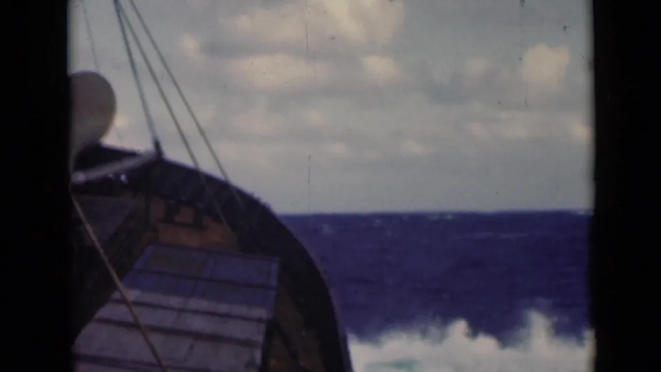Deck-level 8mm frame showing a small boat bow and rigging against whitecaps in the Persian Gulf, based on clip metadata.