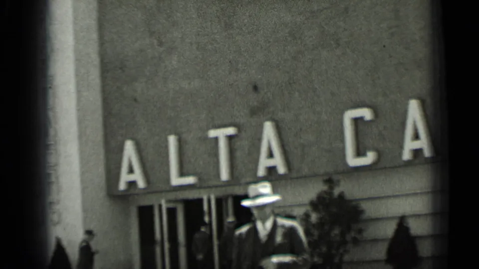 1937 San Francisco frame focused on the ALTA sign and entrance, with pedestrians and a shrub visible in front of the facade.