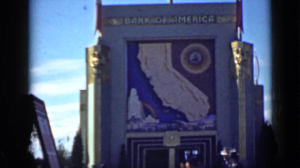 The Bank of America lettering is visible atop the 1939 San Francisco pavilion, above the large California mural.