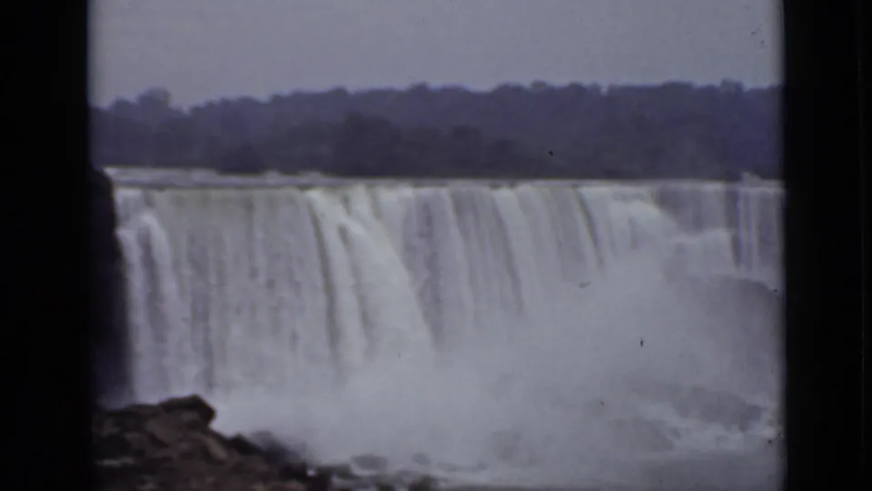 American Falls fills the frame in this 1940 Ontario home-movie shot, with water, mist, distant trees, and dark frame borders visible.