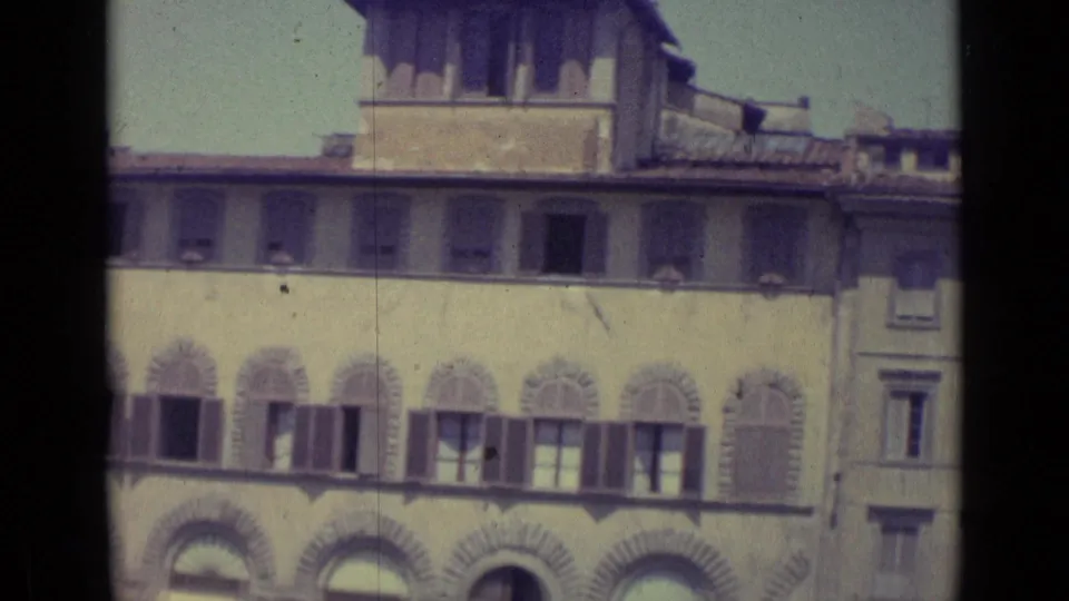 End of the 1962 Florence pan, with repeated arched openings, shuttered windows, roof edge, and dark 8mm border.