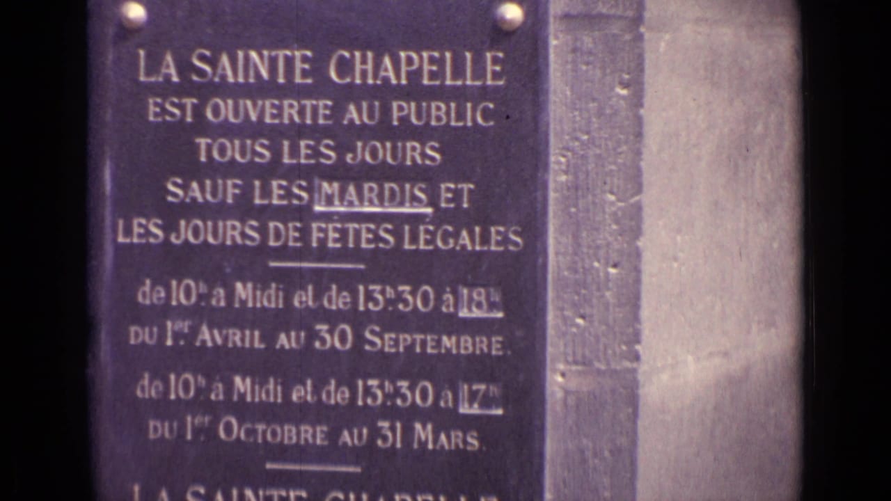 1960s 8mm frame cataloged as Germany showing a French Sainte Chapelle public-hours sign in close-up.