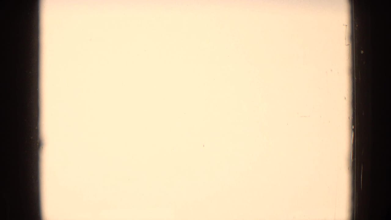 Pale overexposed frame area beside dark film gate edges.