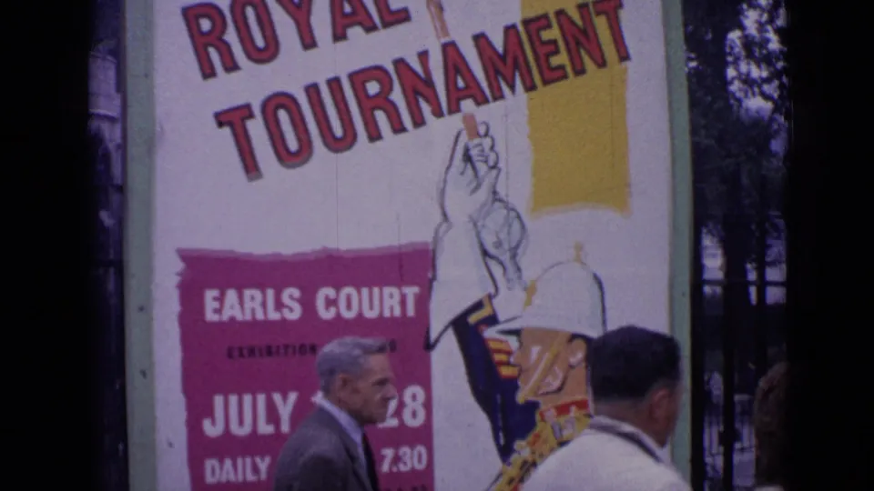 1962 London frame showing pedestrians walking past a Royal Tournament poster with Earls Court text and event dates.