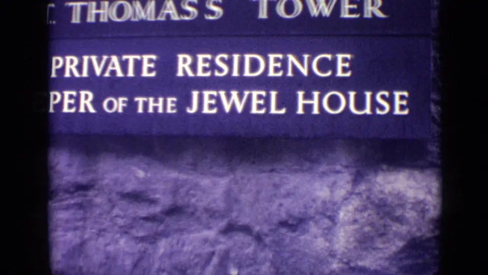 1962 London 8mm frame with a partially cropped St. Thomas's Tower sign and Keeper of the Jewel House text.
