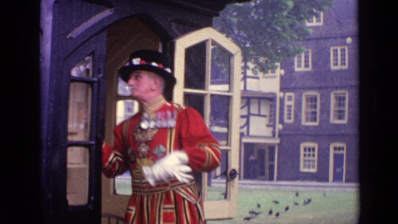 Man in red ceremonial uniform looks out from a doorway toward a courtyard.