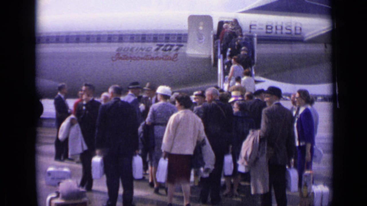 Airport boarding scene with passengers in 1960s dress waiting near stairs beside a Boeing 707 Intercontinental aircraft.