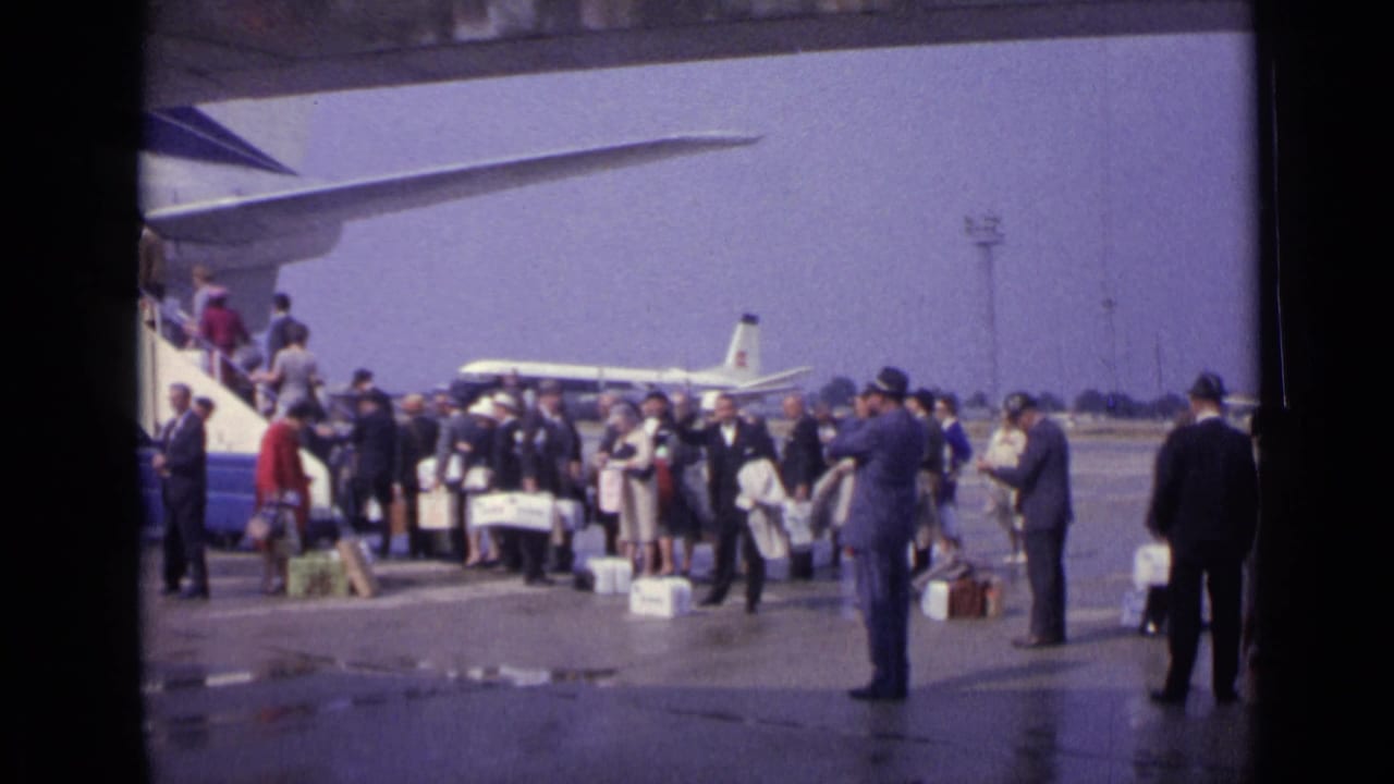 1962 London tarmac boarding scene with passengers, luggage, mobile stairs, and a jet airliner visible in the background.