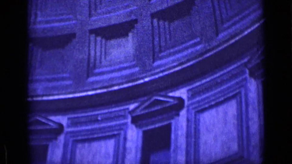 1962 Rome 8mm view of classical interior surfaces with layered molding, paneled sections, and partial column-like forms.