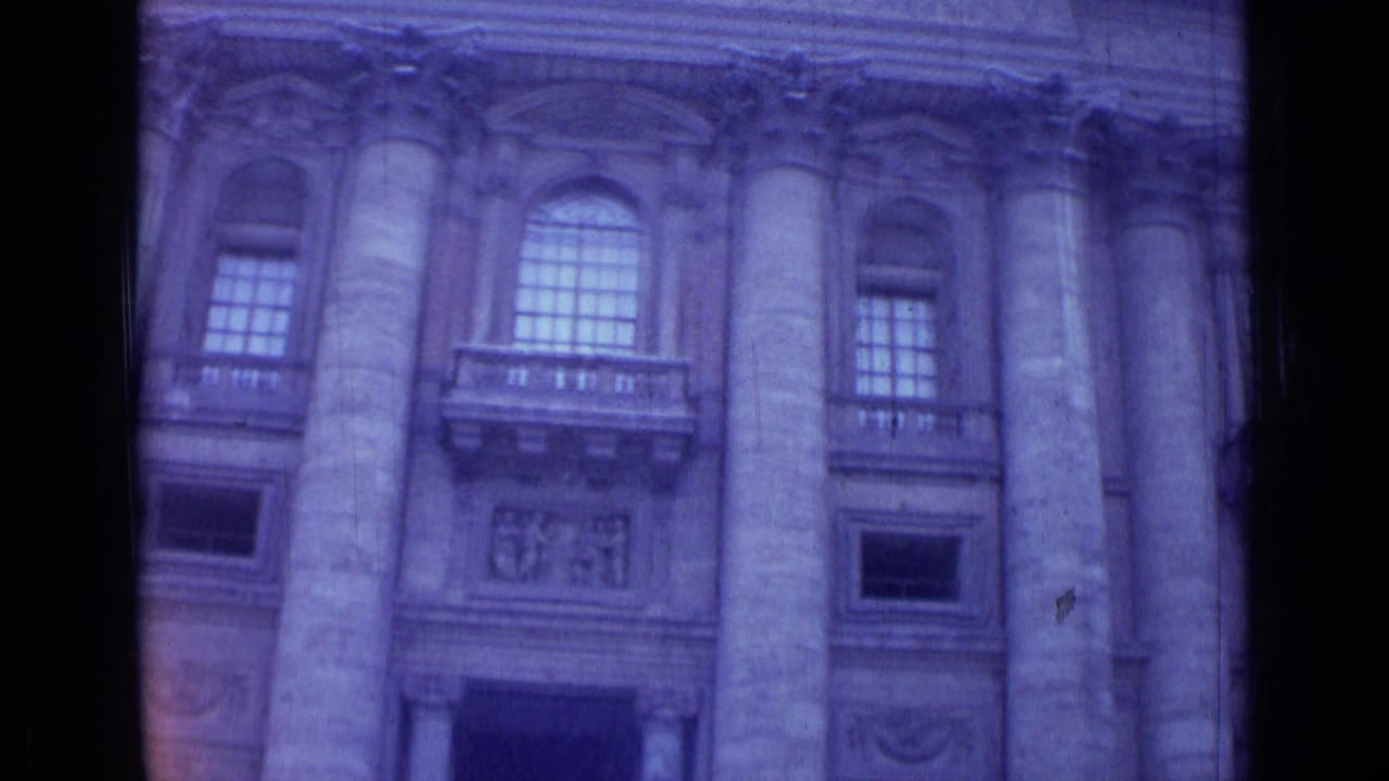 1962 Rome 8mm view of a monumental facade with columns, arched windows, and carved architectural details.