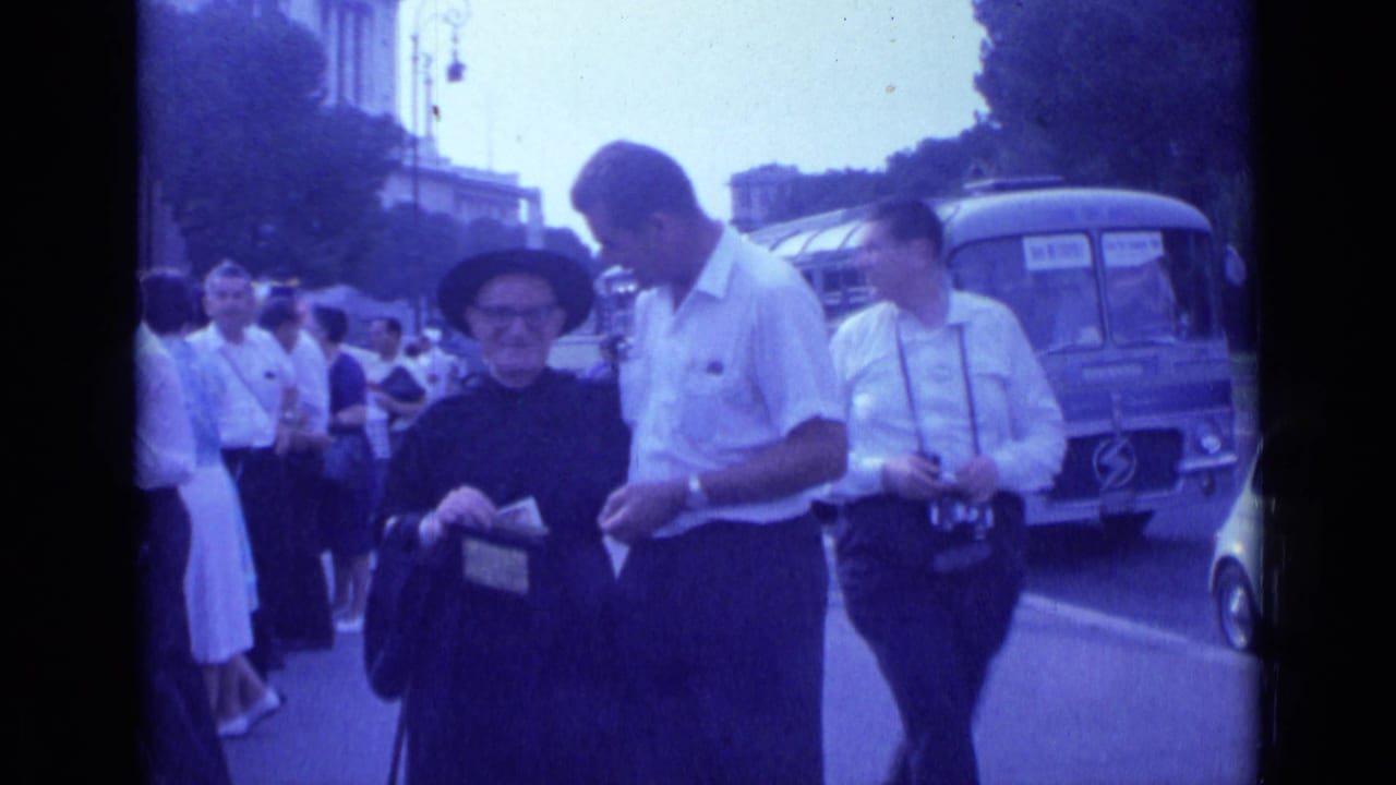 In 1962 Rome, a man in a white shirt faces a nun in a black habit holding a donation box, with pedestrians and a bus behind them.