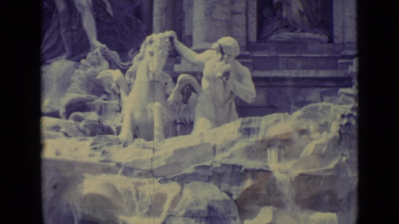 Vatican City fountain detail with carved figures and horse sculptures, captured on faded early-1960s 8mm film.
