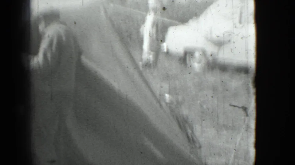 The final frame is softer and more blurred, showing the man near the tent flap while the car and background figure remain partially visible.