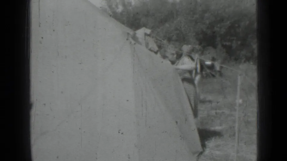 The final frame shows a woman near the tent wall and another figure by the guy line in the grassy campsite.