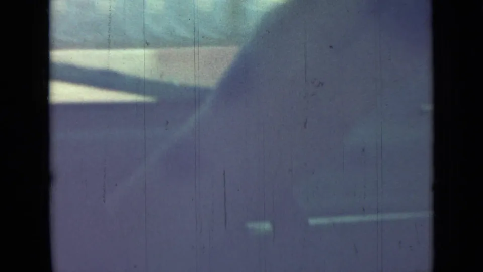 The final frame shows a shadowed car-window view with faded blue-purple color and faint roadside detail from the moving vehicle.