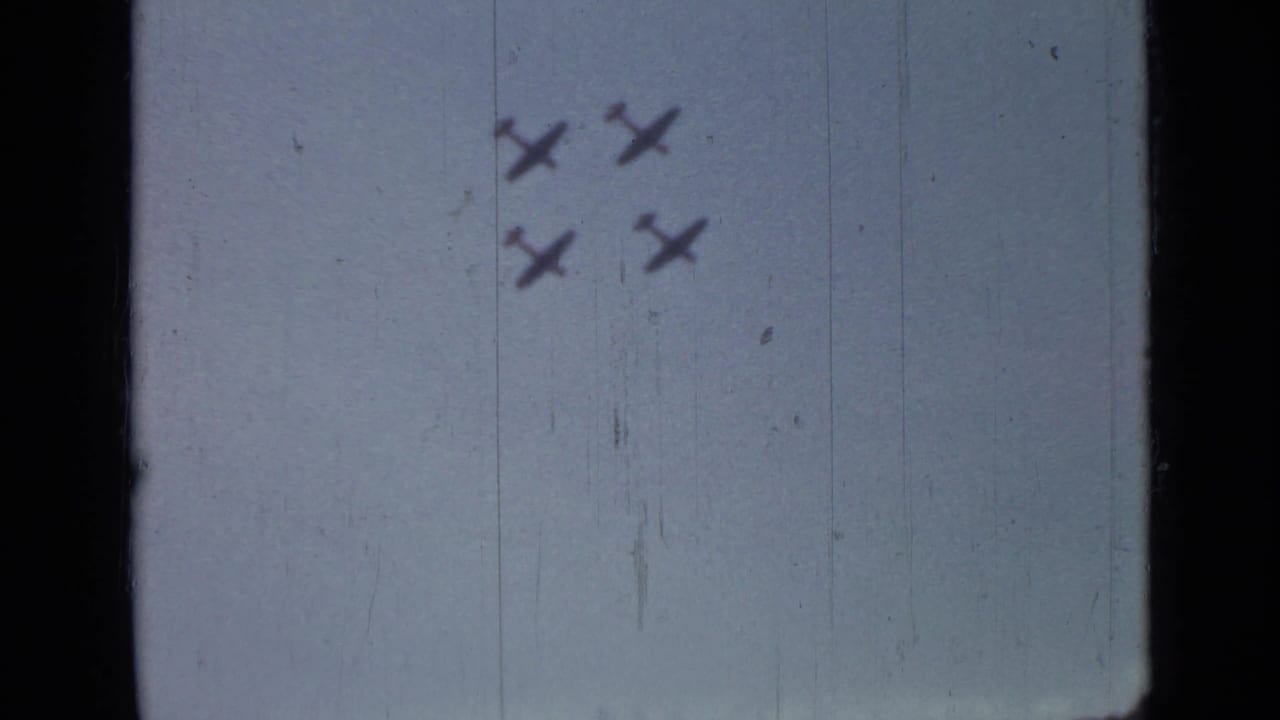A group of four aircraft is visible near the top of the frame in the Saint Petersburg 8mm clip.