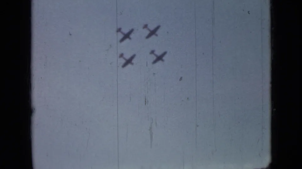 A group of four aircraft is visible near the top of the frame in the Saint Petersburg 8mm clip.