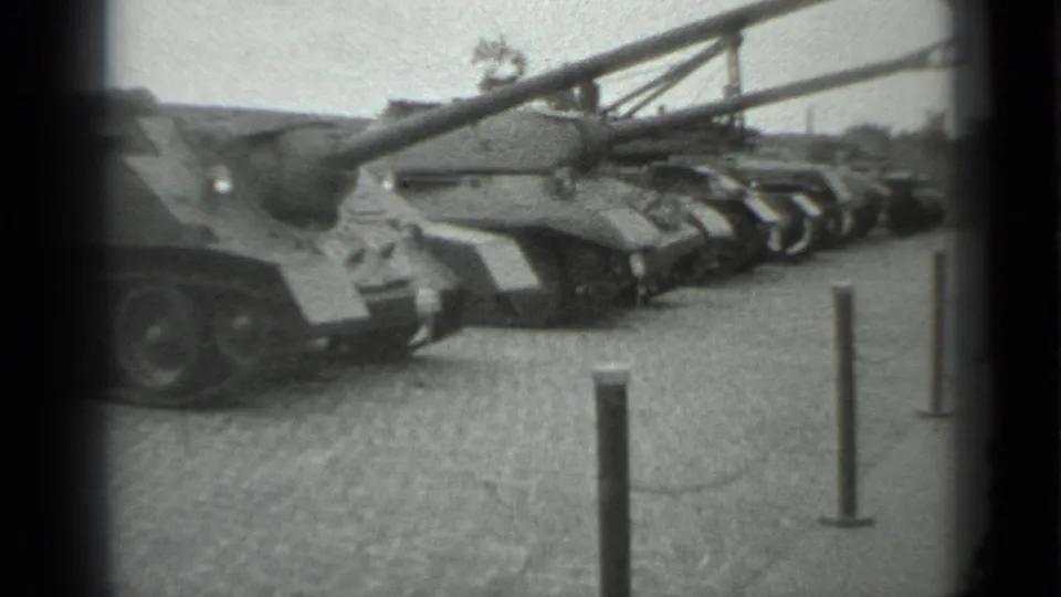 Closer 1983 Moscow 8mm view of a tank and its long barrel in a public outdoor military display.