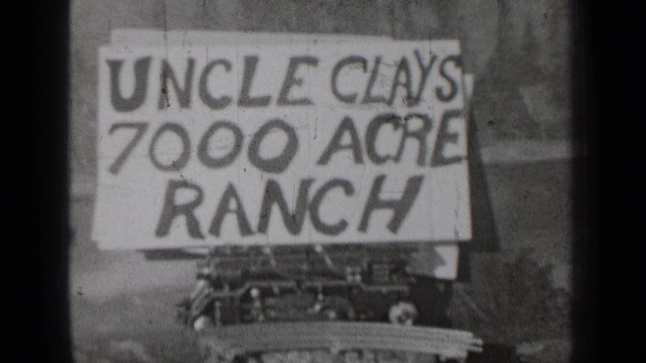 Hand-painted Uncle Clays 7000 Acre Ranch sign mounted above a vehicle or display base.