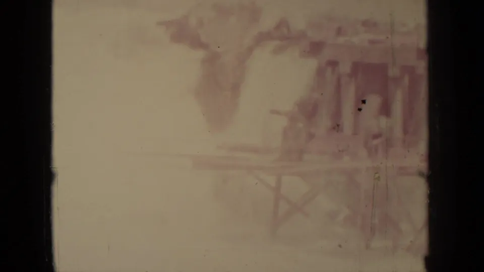 Hazy 1937 Klamath, California frame with a small wooden structure and supports partly visible near the right edge.